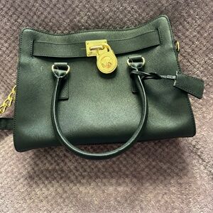 Michael Kors and 2 Dooney & Burke.